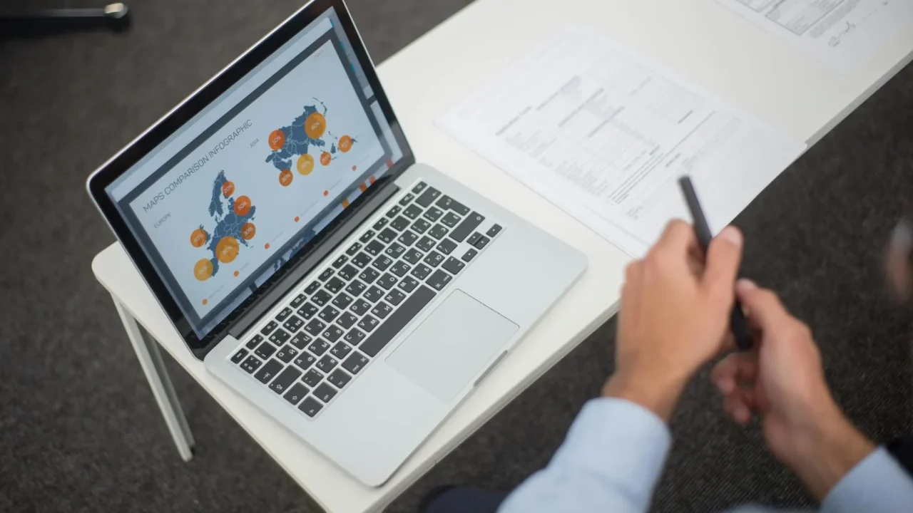 Business Owner Laptop City Map